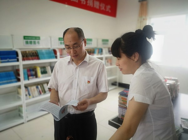 宣城市烟草专卖局行政第二党支部开展泾县安吴村希望小学“捐书助学”主题党日活动.jpg